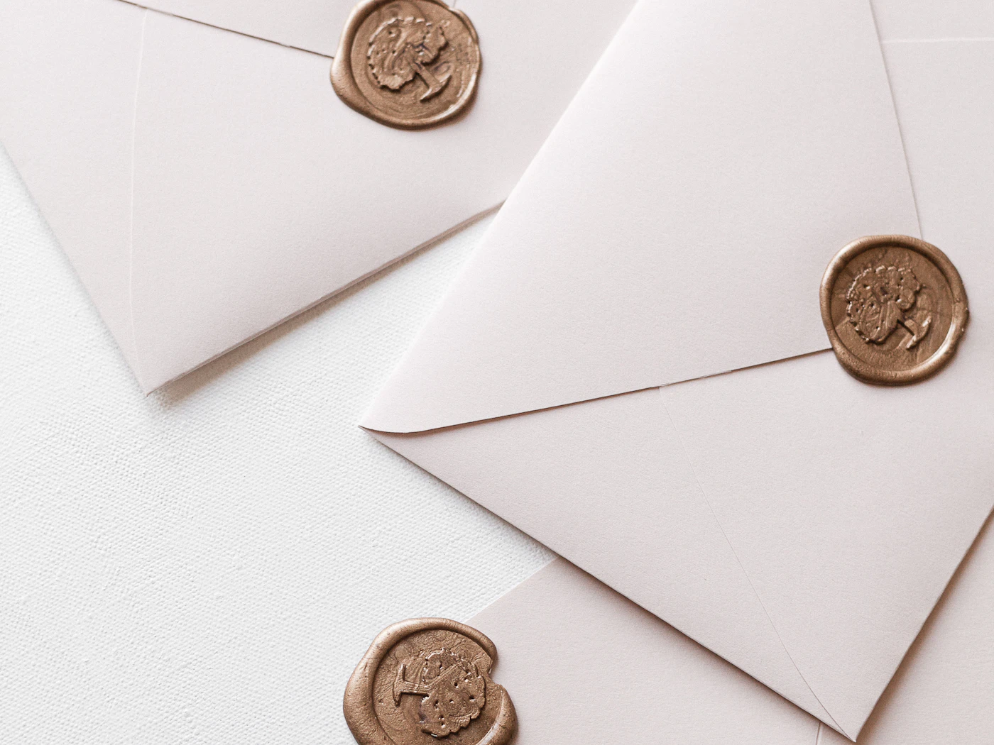 Wax-sealed envelopes holding executed originals
